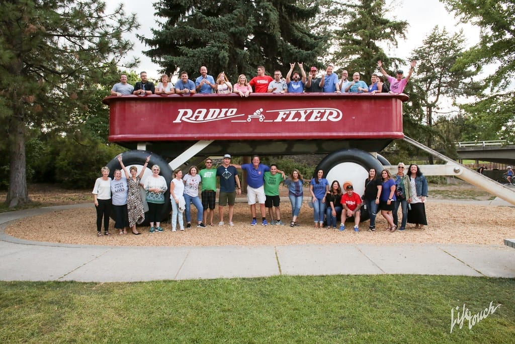 Principals gathered in front of the world's largest "Radio Flyer" wagon in Spokane's Riverfront Park, during the 2019 NAESP Pre-K–8 Principals Conference.